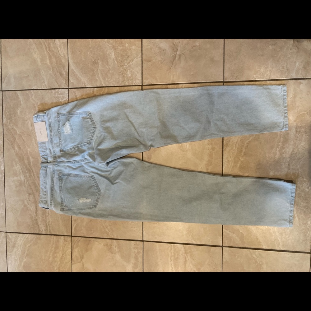 Light blue distressed jeans
